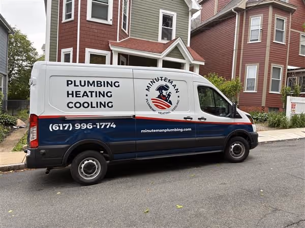 Minuteman Plumbing, Heating & Cooling service vehicle or team